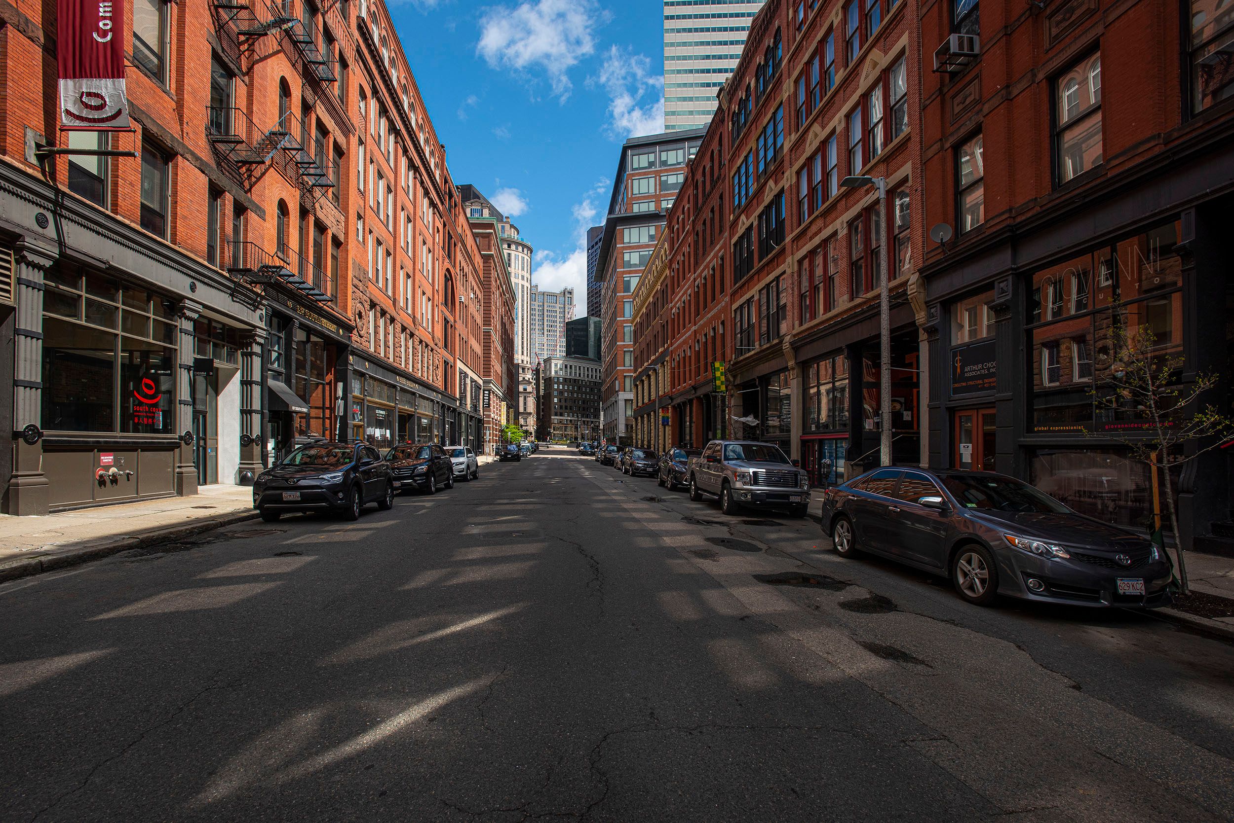 Photograph of old brick buildings and empty streets in the Leather District. Boston, MA Leather District