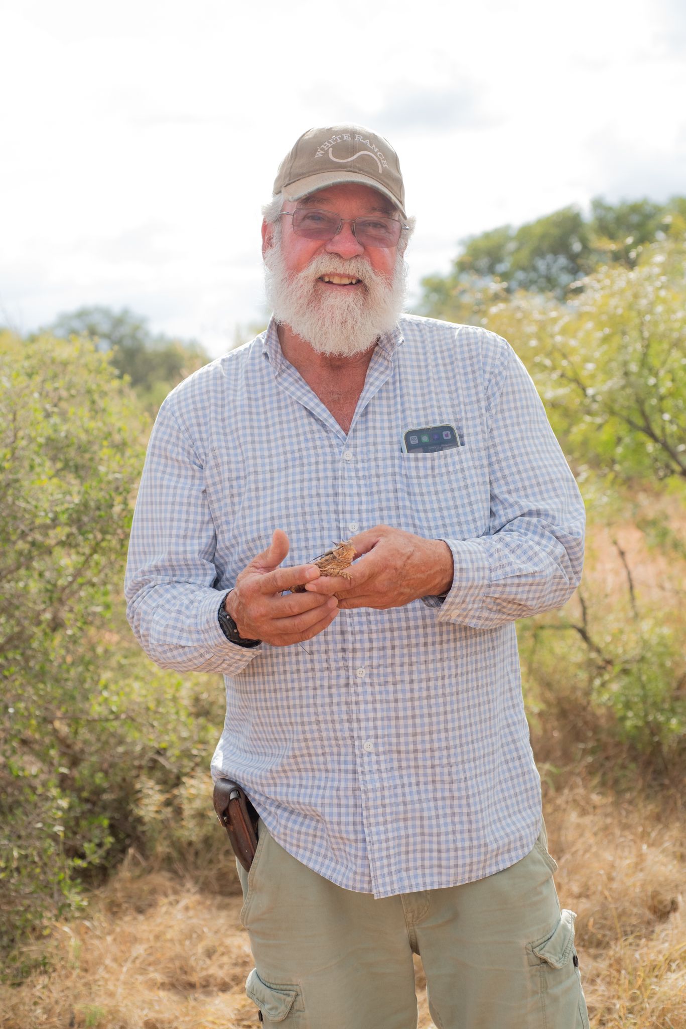 Brian Wright holding a Texas horned lizard.