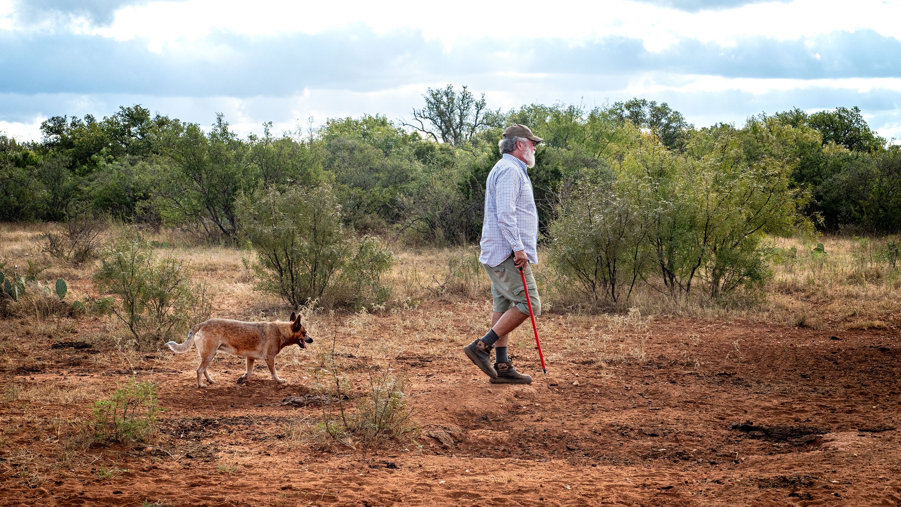 Brian Wright walking on White Ranch with dog Gabi