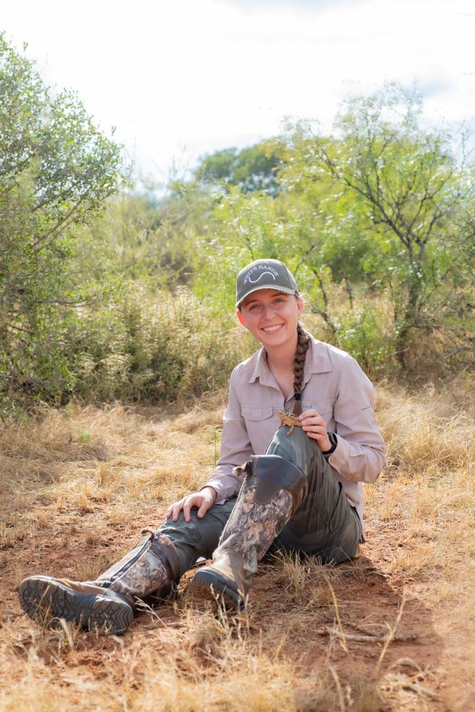 Kira Gangbin holding a Texas horned lizard