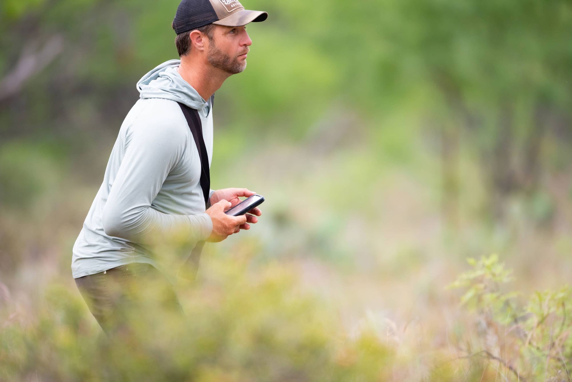 A man looking for songbirds