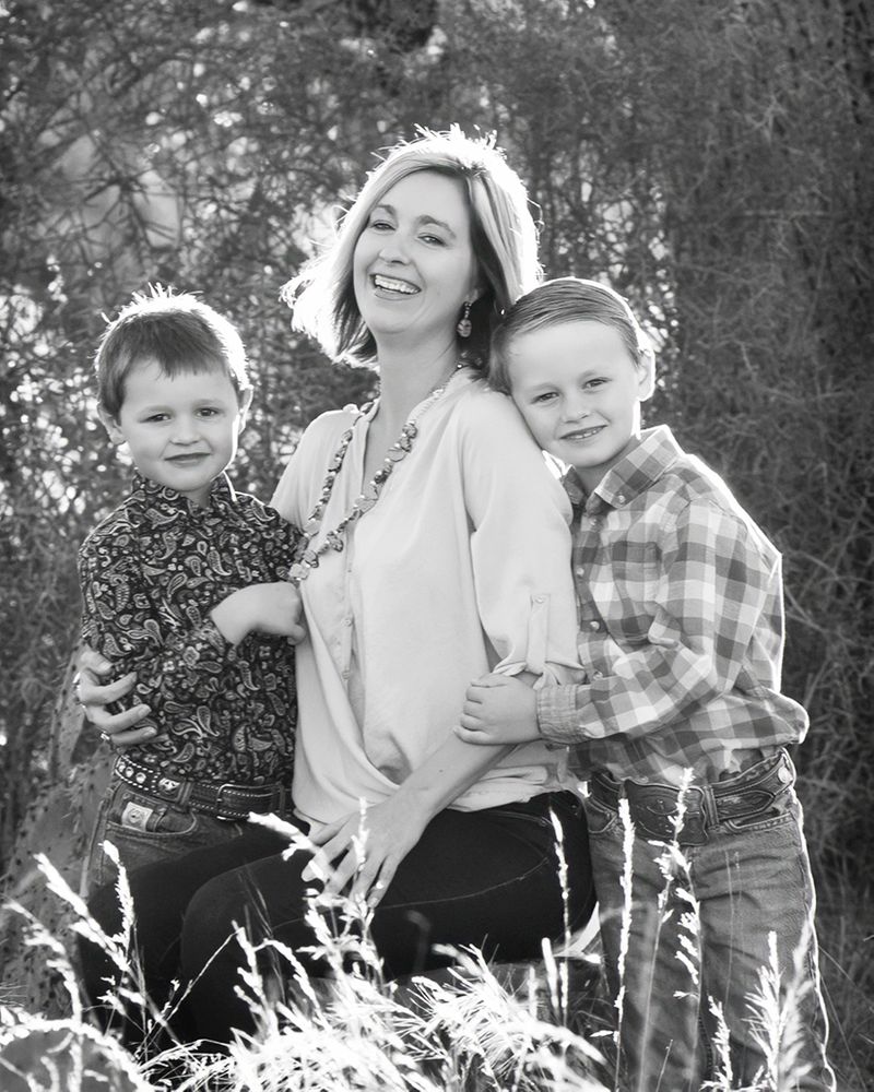 A portrait of a mom and her boys