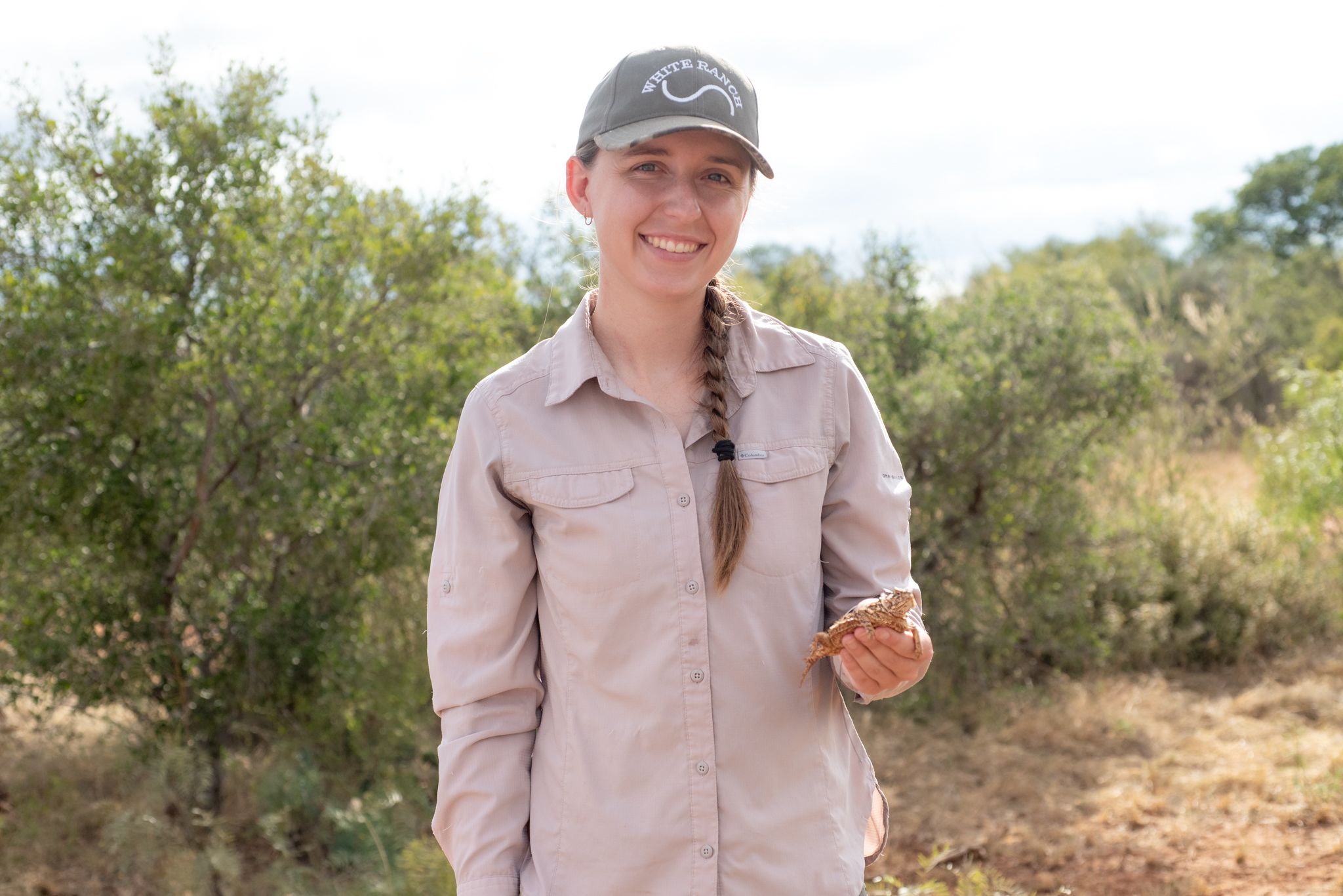 Kira Gangbin holding an endangered Texas Horned Lizard on White Ranch