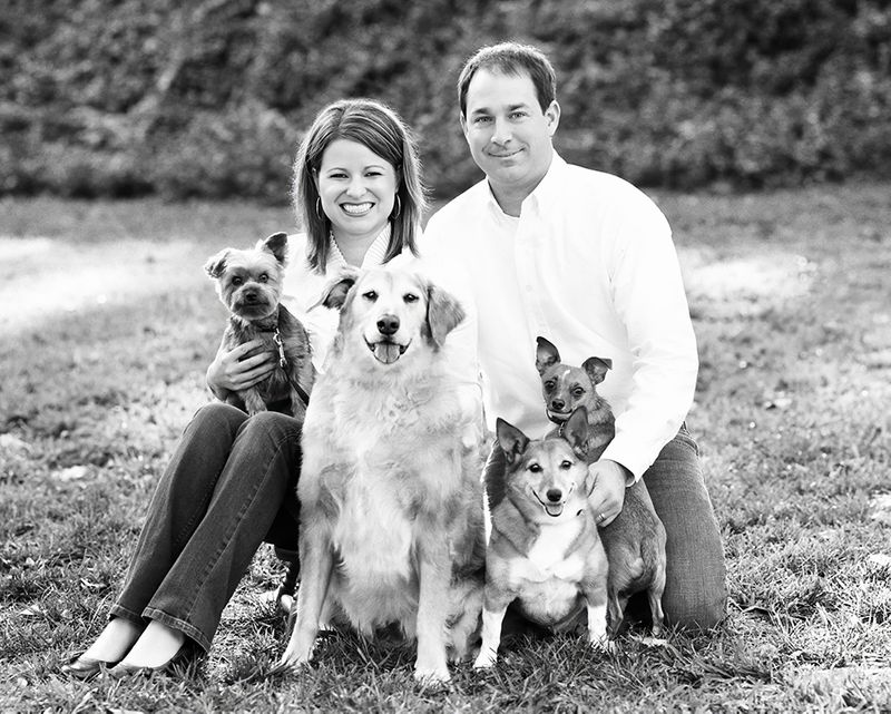 Outdoor family portrait including furry family members
