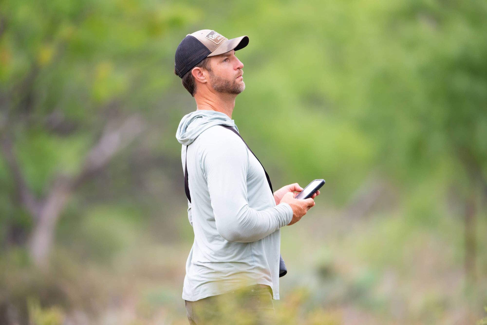 A biologist on a songbird survey