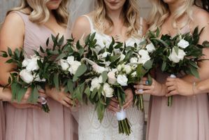 Bride with bridesmaids and bouquets