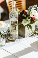 High west whiskey bottle with flower centerpiece
