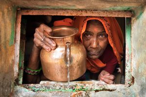 Lady with Water Jug
