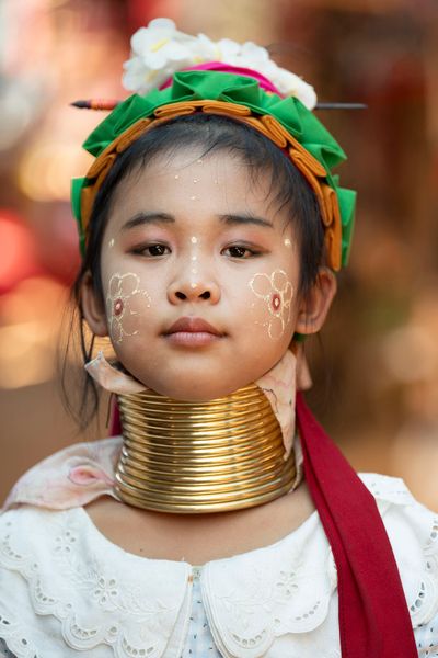 Long Neck Child with pencil