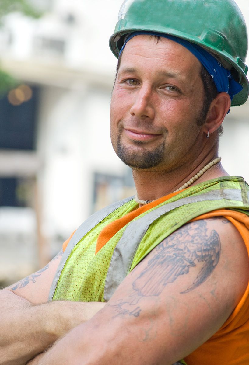 Good looking construction worker with an eagle tatoo Picture of Construction worker