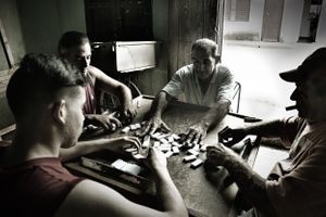 Cuban men playing Dominoes