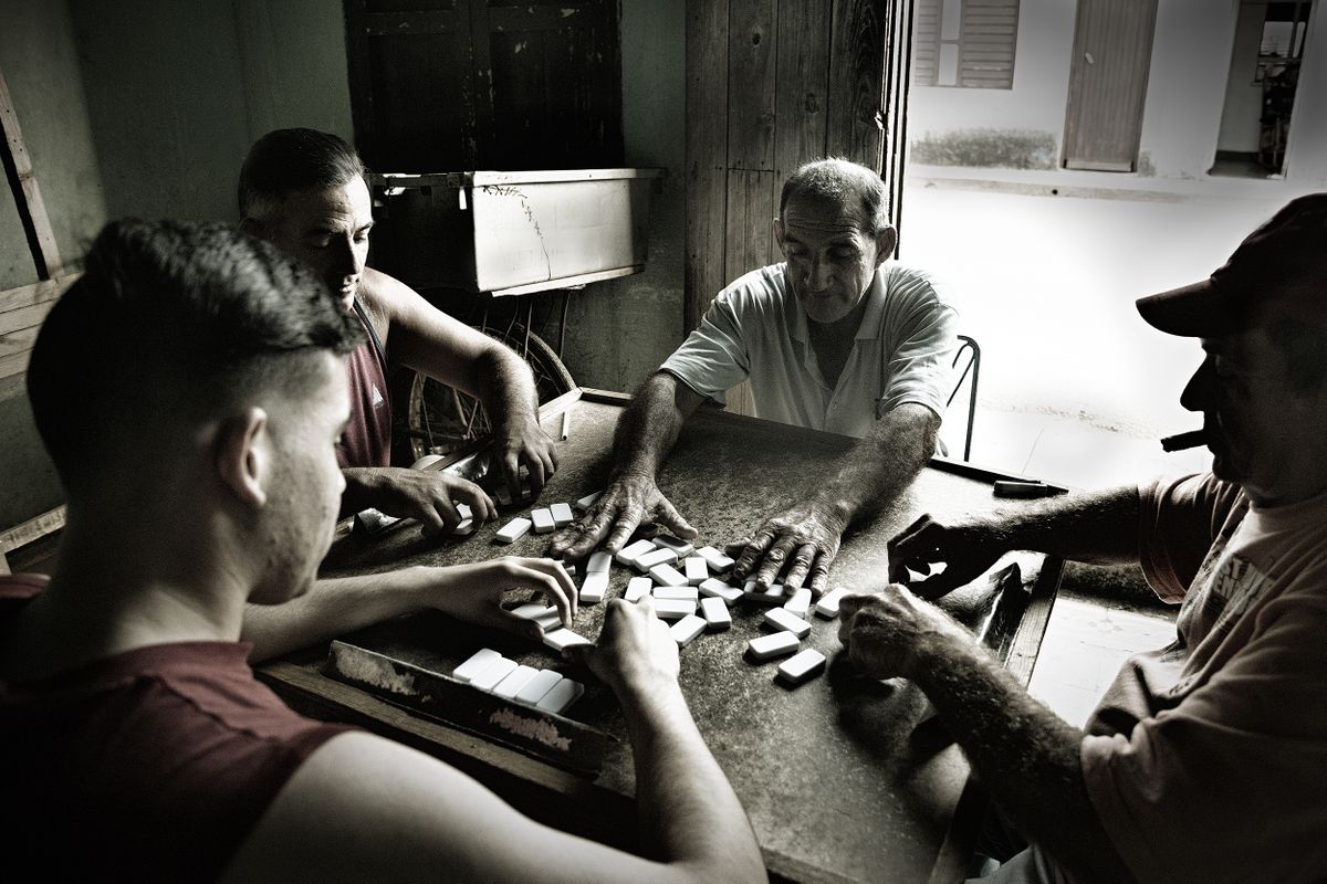 Cuban men playing Dominoes