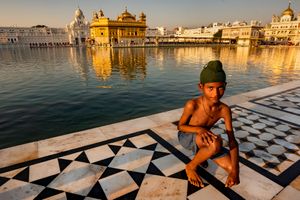 Young boy going to bathe