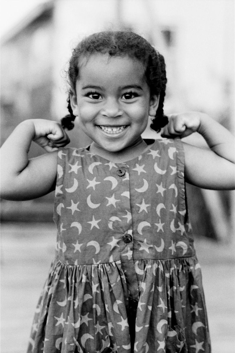 little girl flexing in the photo flexing photots