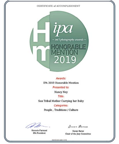 San carrying her baby