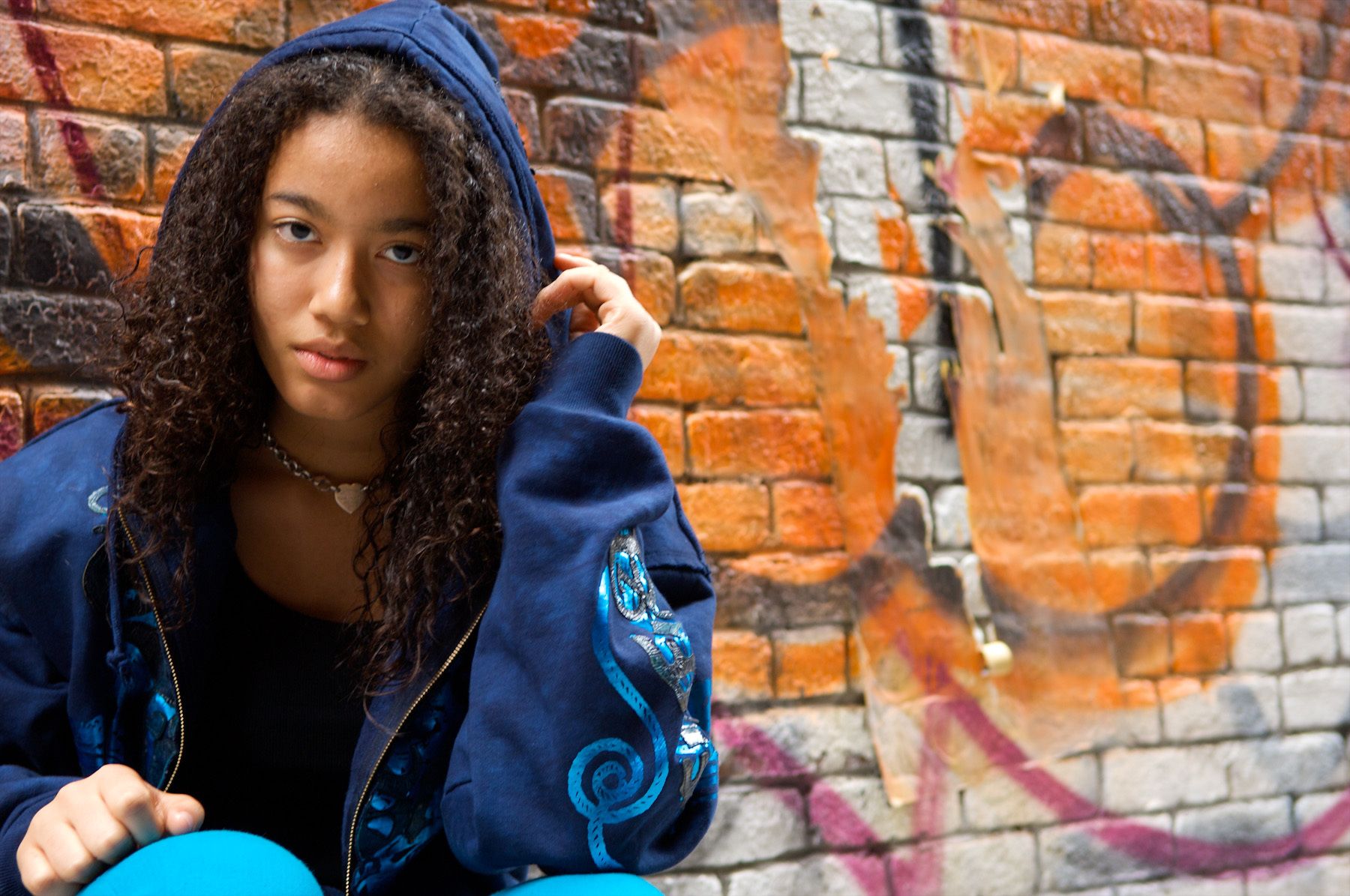 Pictures of a mixed race young girl against a grafitti wall Grafitti wall pictures
