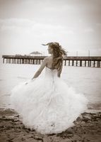 Bride dancing on the beach