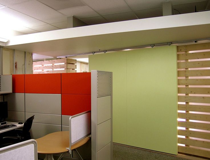 Herman Miller Furniture detail at the sliding green gate to the conference rooom. 1Sutter_Health_Construction_Office_8