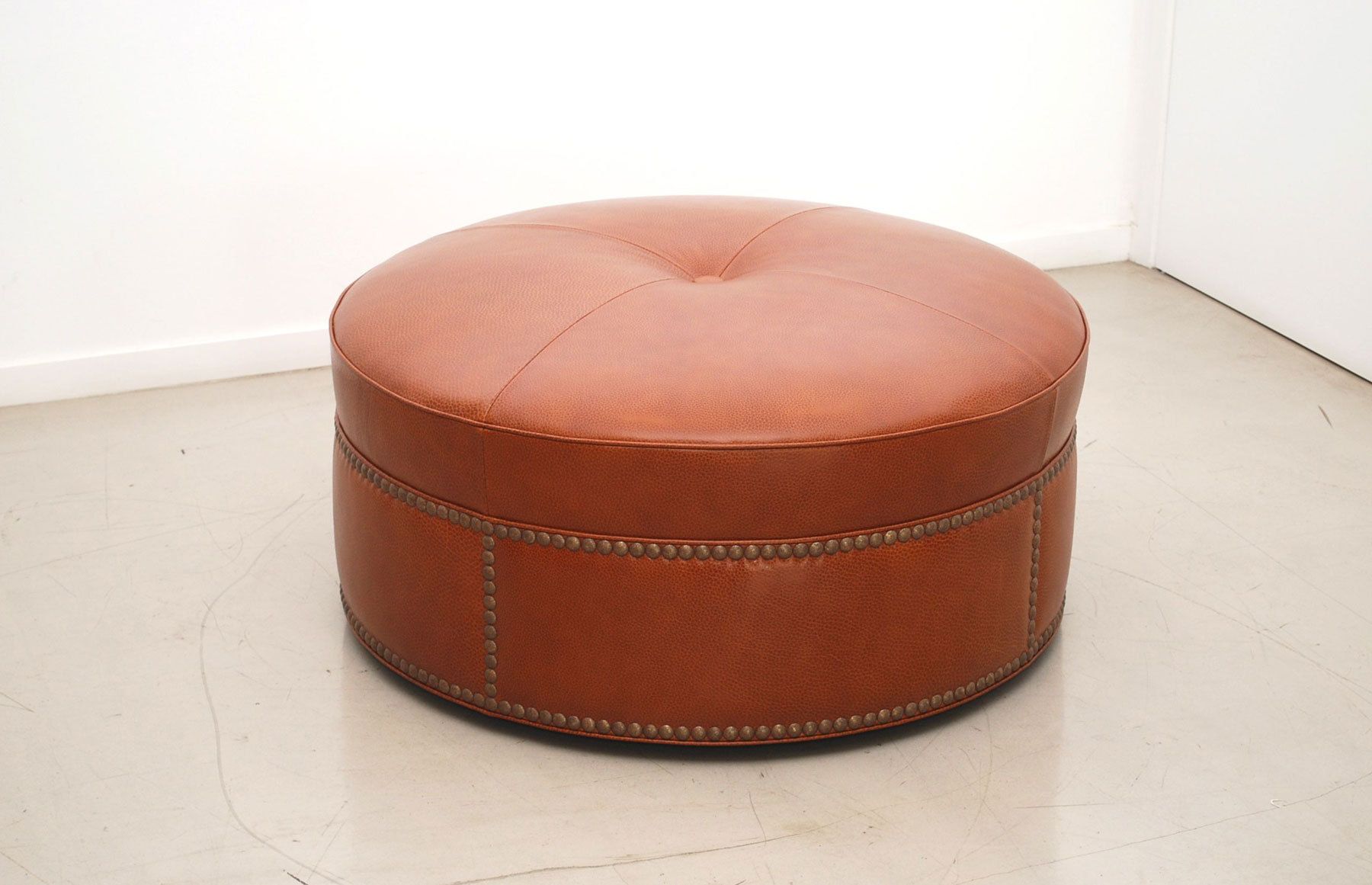 Custom round leather ottoman