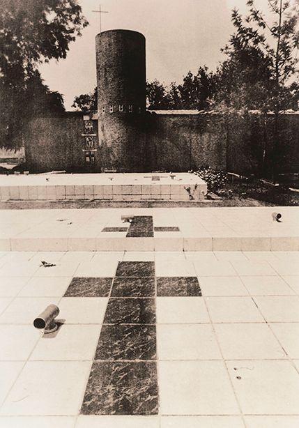 Crosses covering mass grave - Nyamata copy.jpg