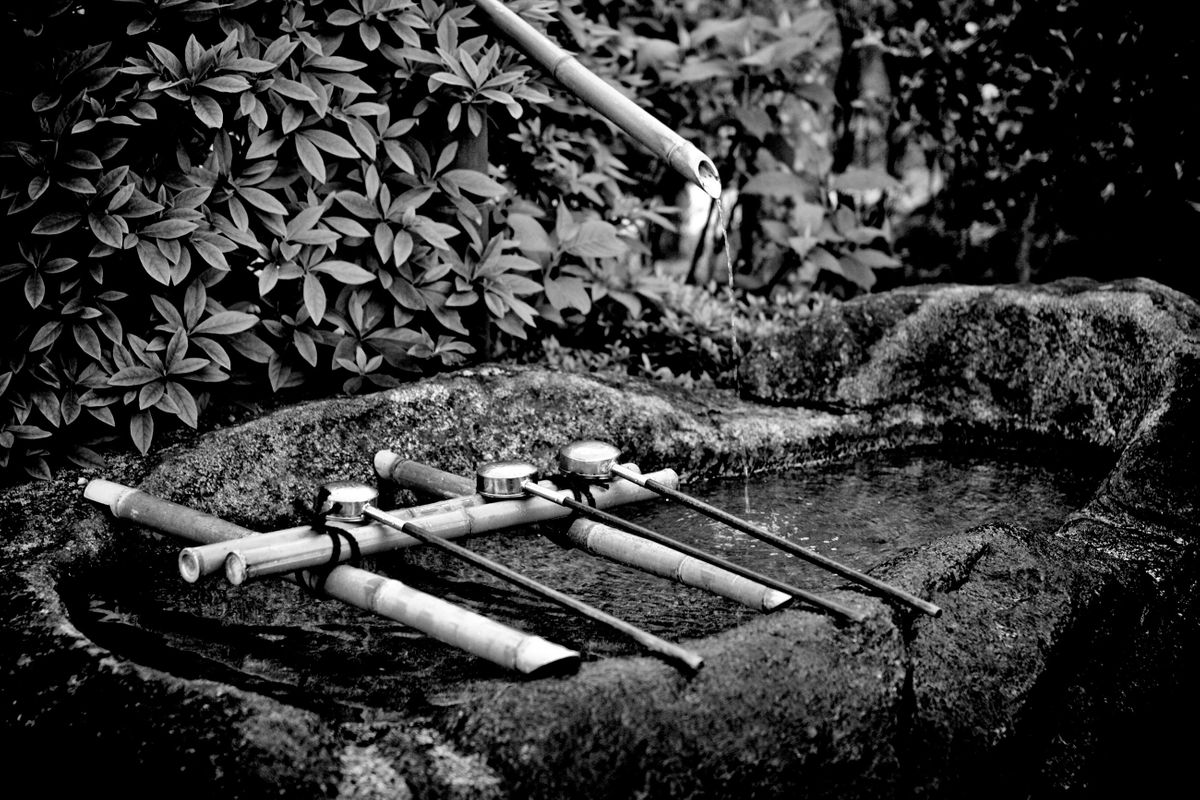 Water purification ceremonial fountain. Hase-dera Buddhist Temple. Kamakura, Kanagawa, Japan.