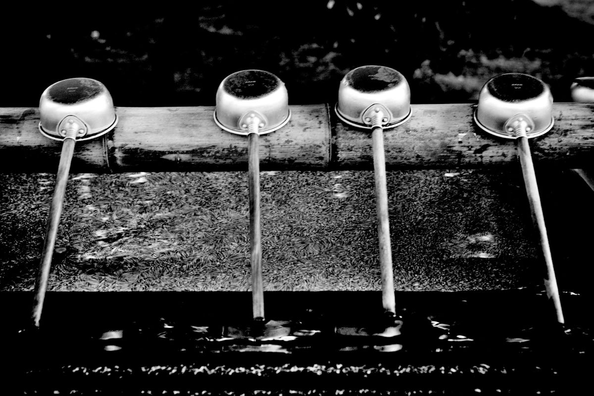 Water purification ceremonial fountain. Nezu Shinto Shrine. Nezu, Tokyo, Japan.