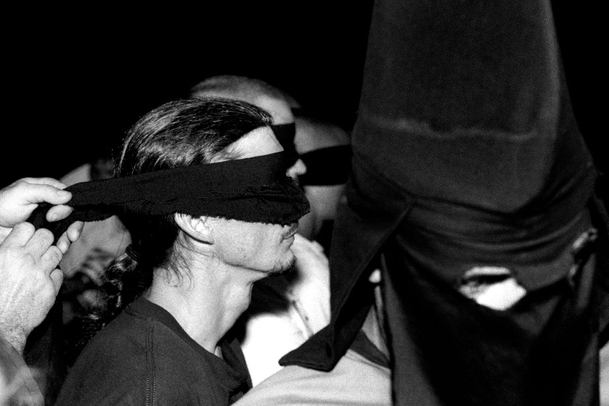 Aryan Nations Knights of the Ku Klux Klan initiation ceremony. Colt, Arkansas 2003