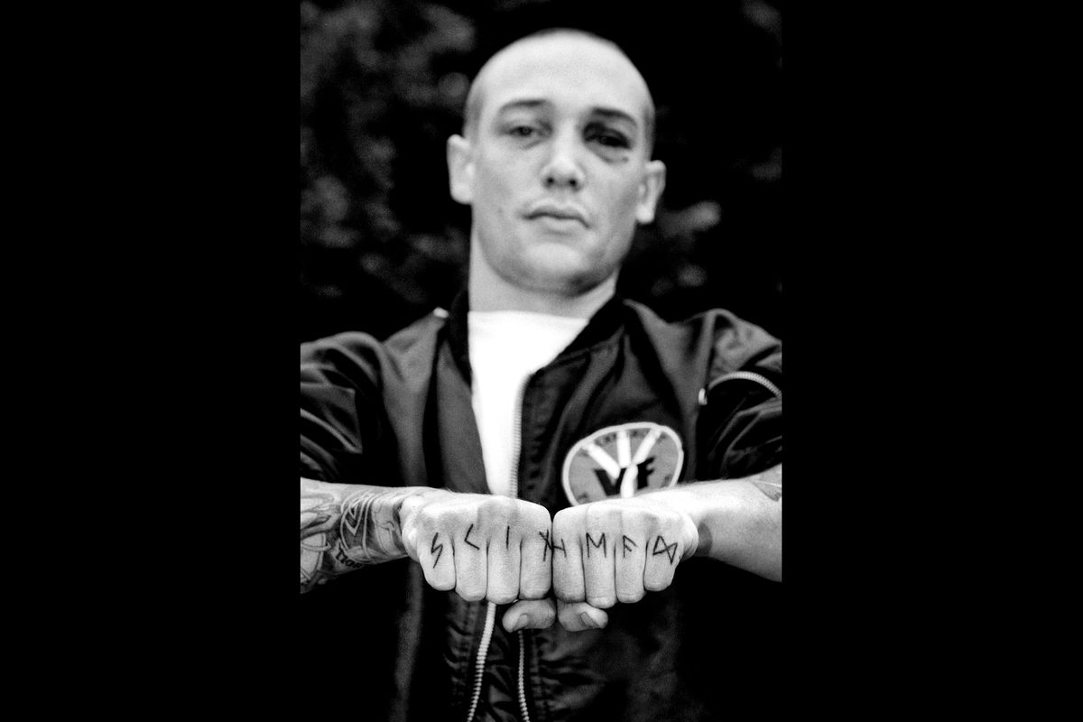 A member of Volksfront, a neo-nazi skinhead group, at Aryan World Congress. Athol, Idaho 2003