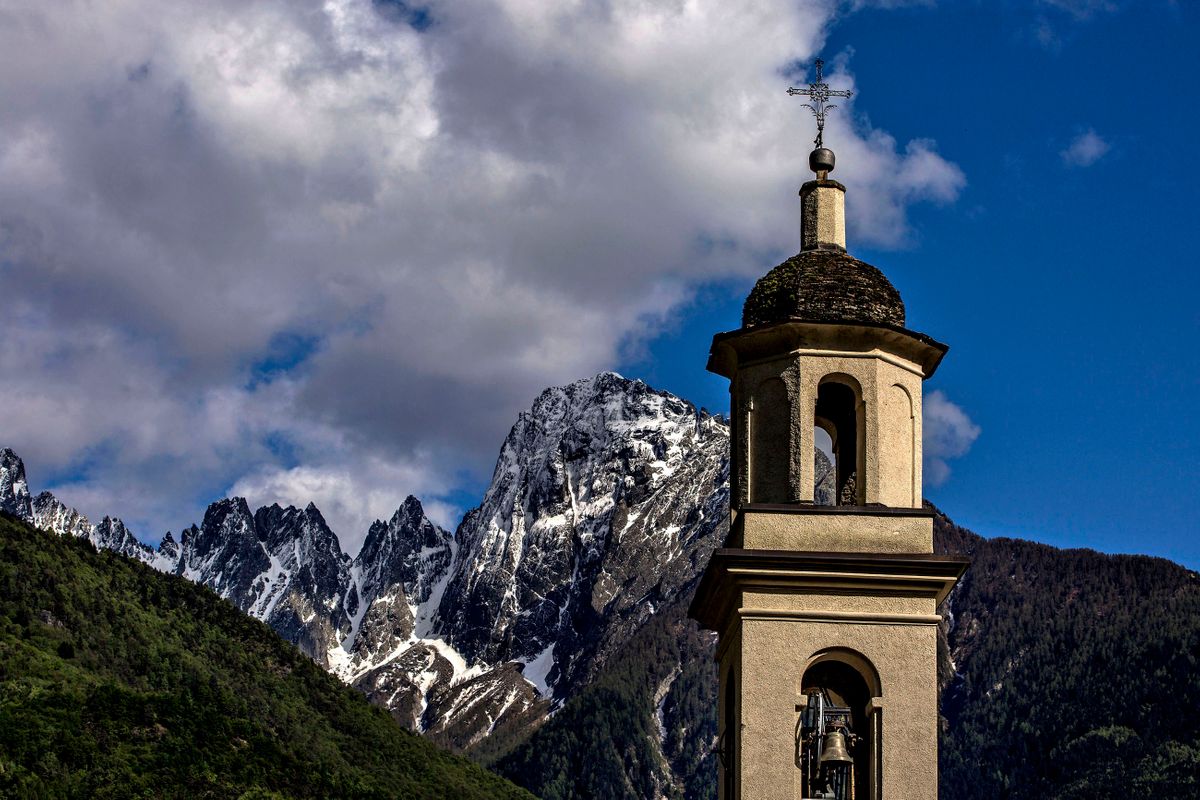 Steeple and Italian Alps. Chiavenna, Italy