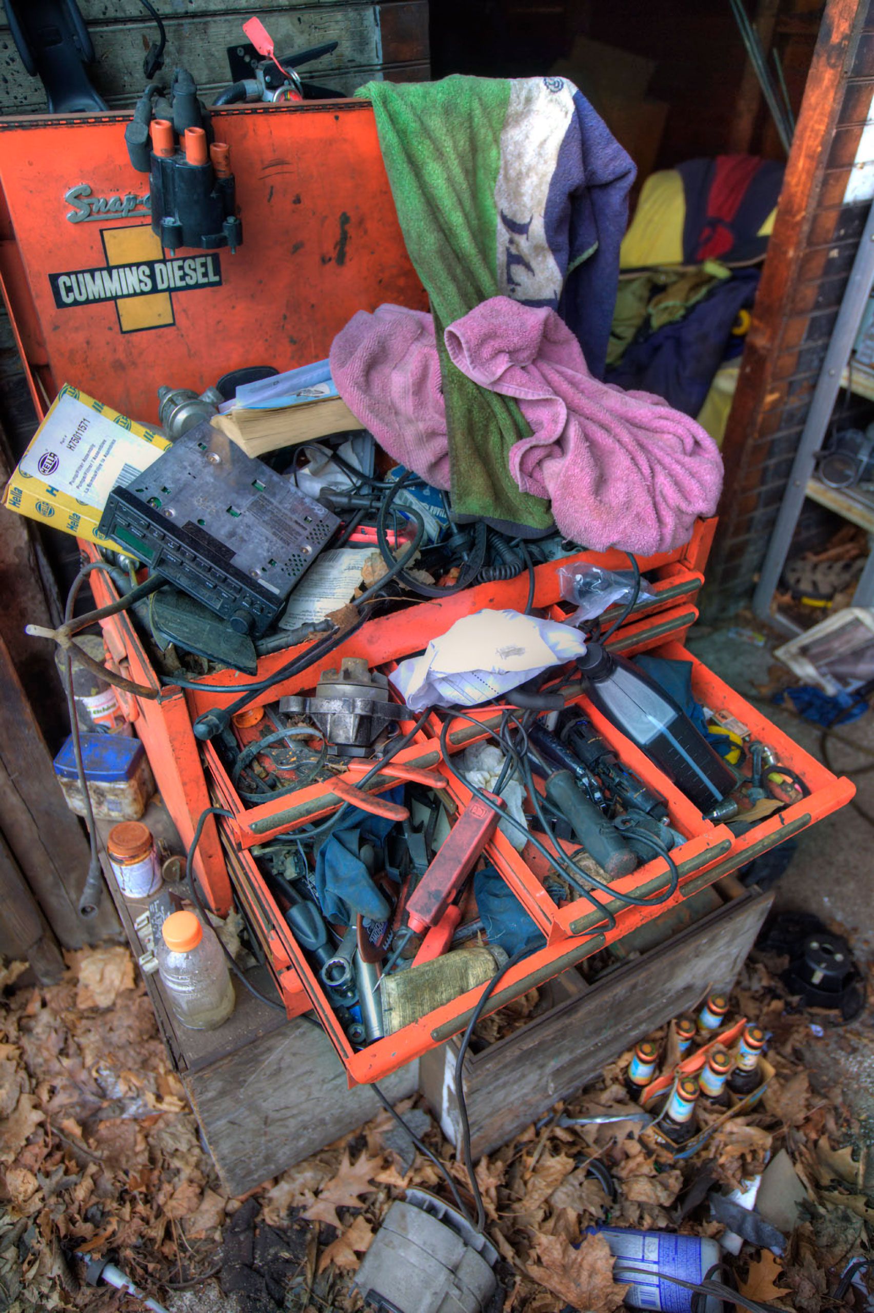 Messy tools in a messy too chest in repair  garage 