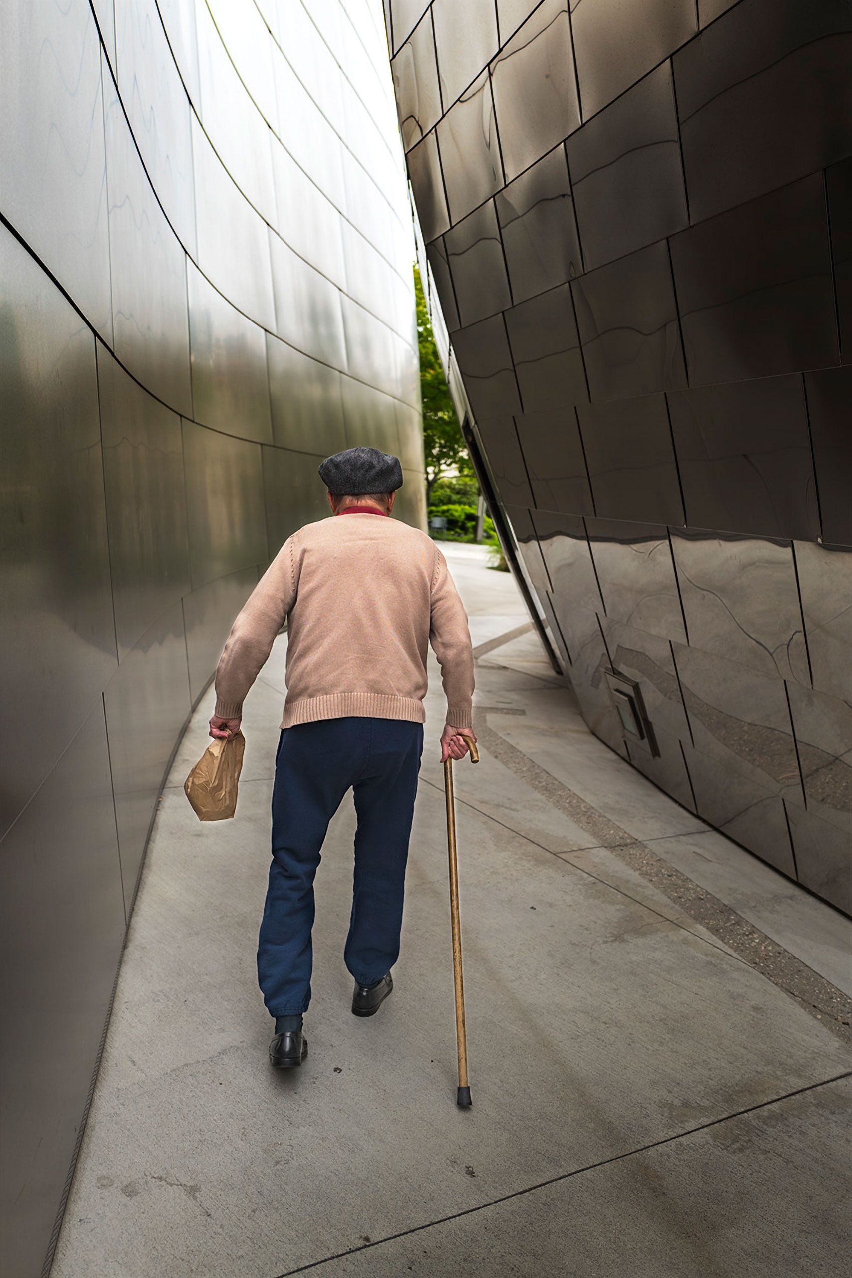 elderly man with his lunch Walt Disney Concert Hall designed by Frank Gehry