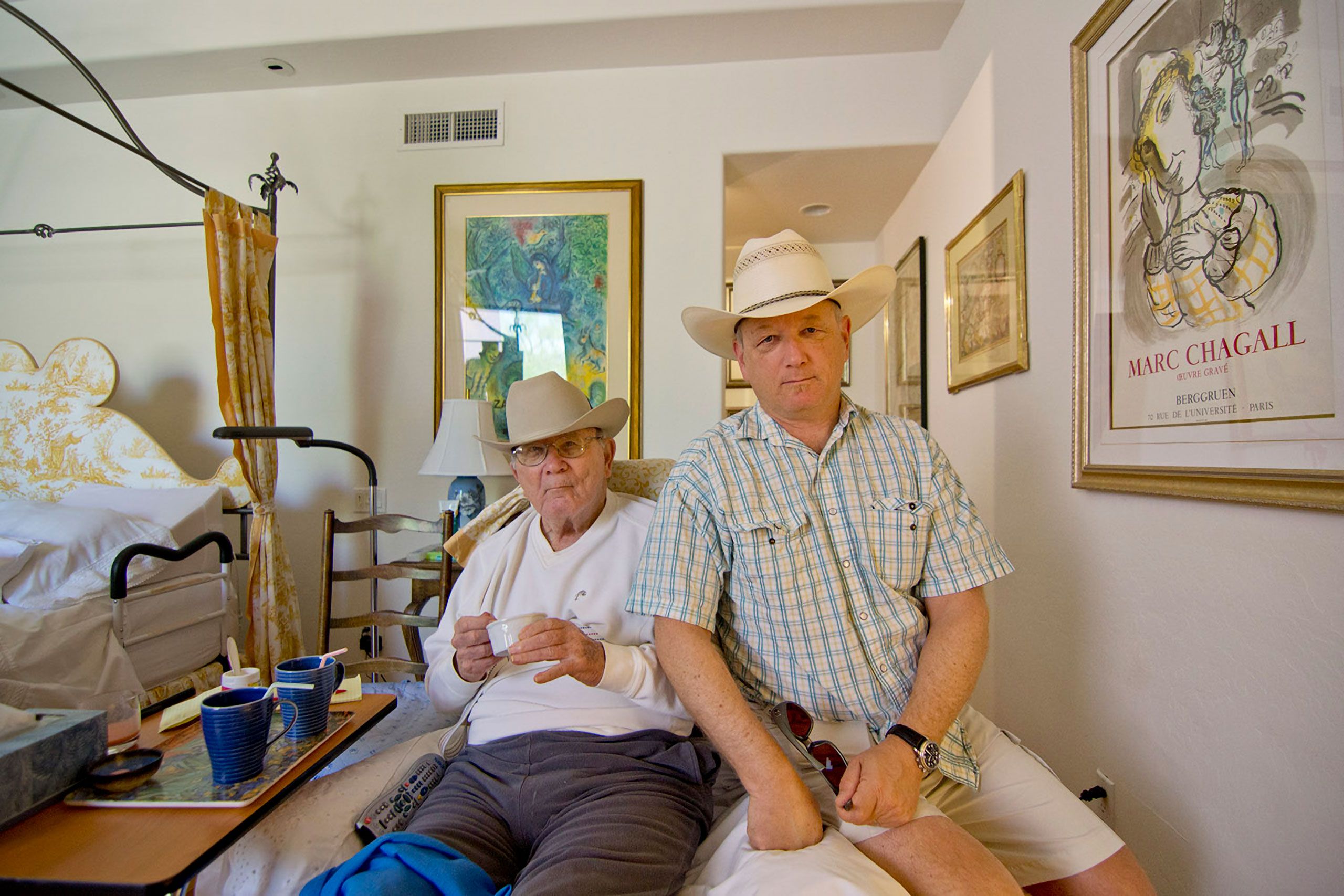Father and Son in cowboy hats Floyd Warren Roos