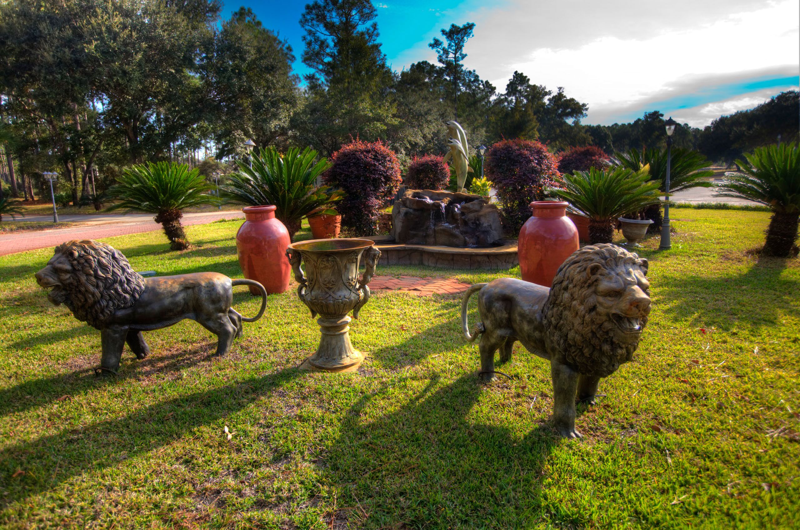 lions near houses by Santa Rosa Beach Community Church