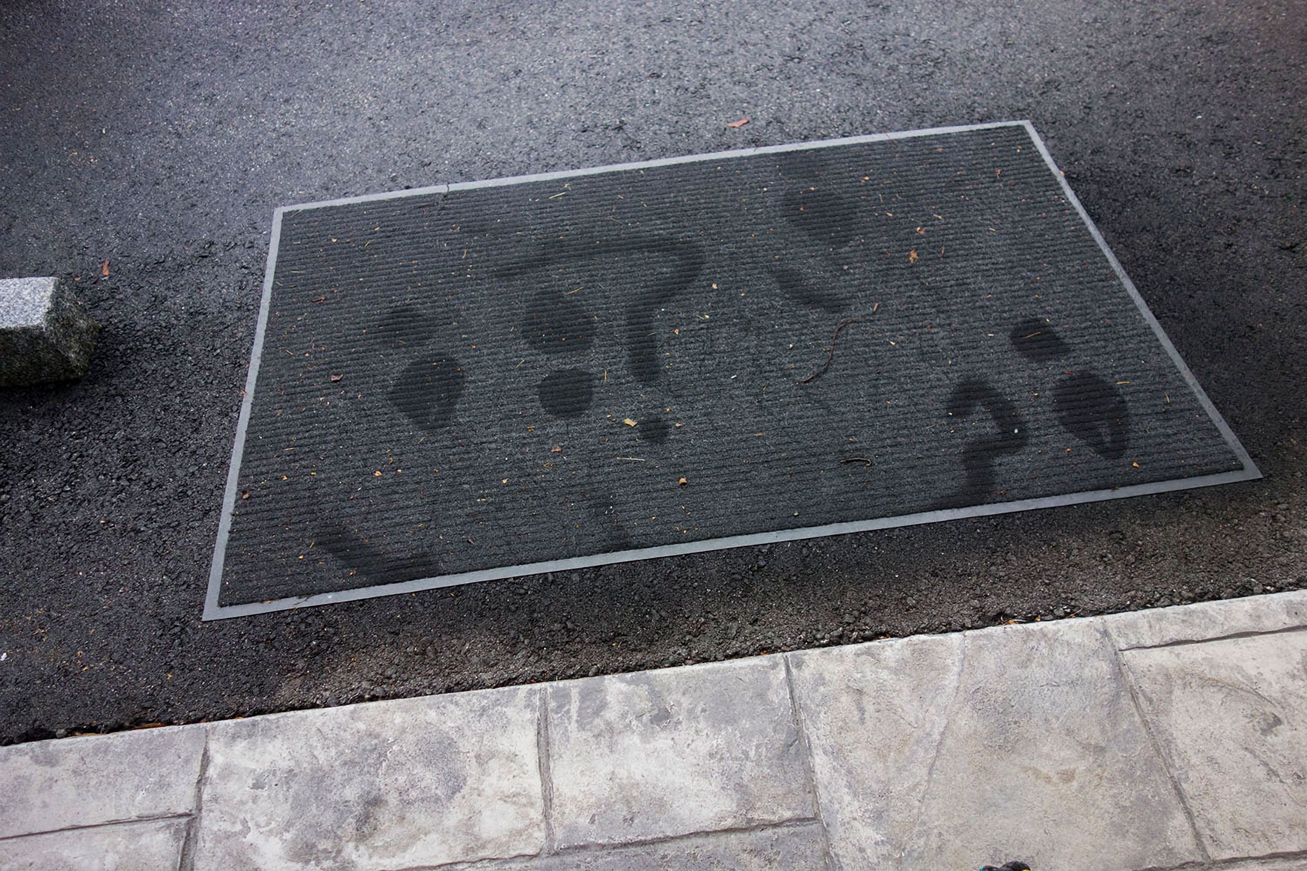 Message on welcome mat Warren Roos Photo Studio