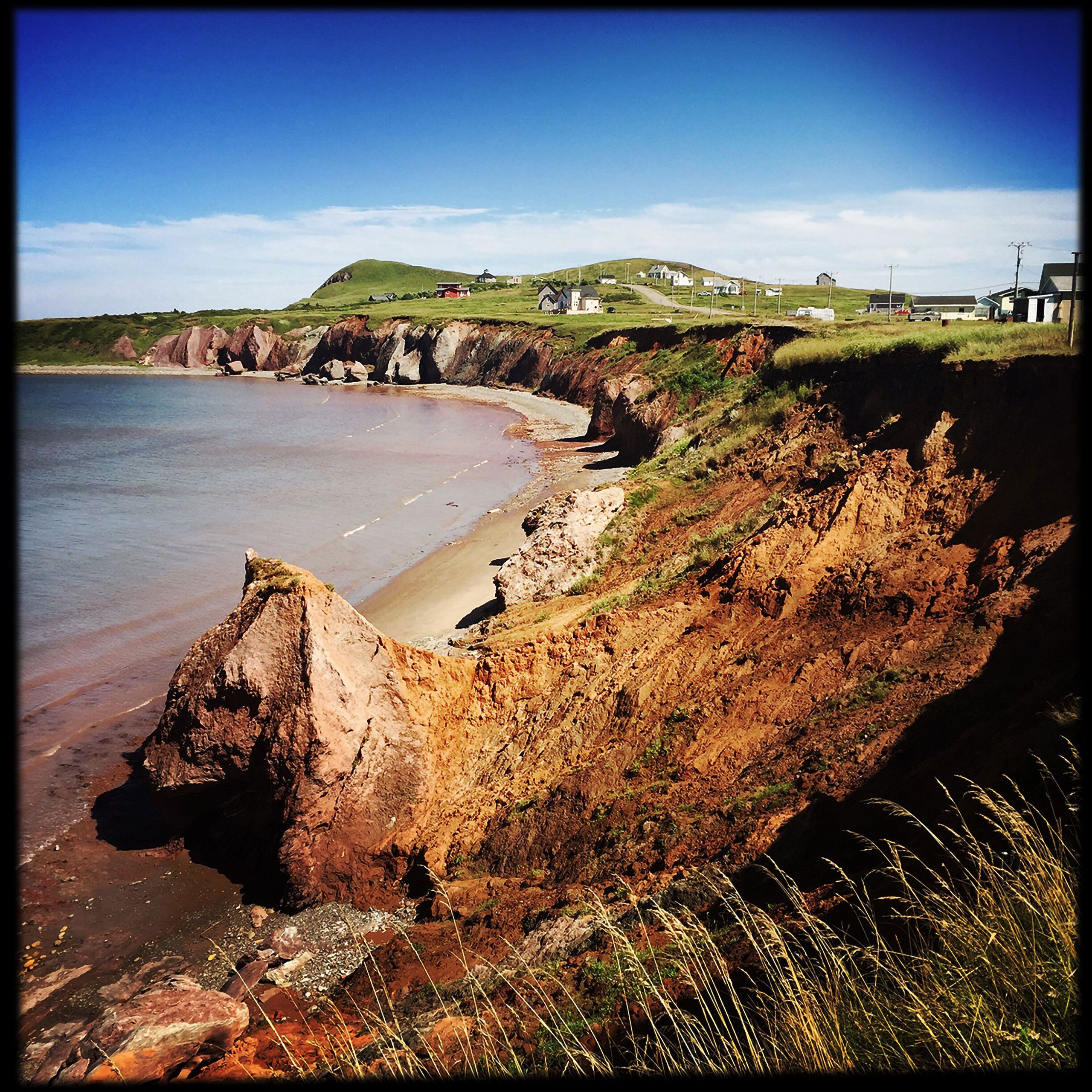 dog face in cliff  Magdalen Islands Îles de la Madeleine Quebec Canada  Harve Aubert