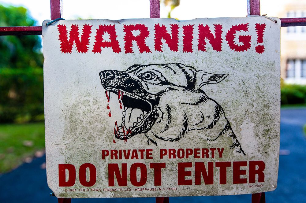After you. vicious blood man-eating dog dogs private property do not enter Miami Florida. warning 