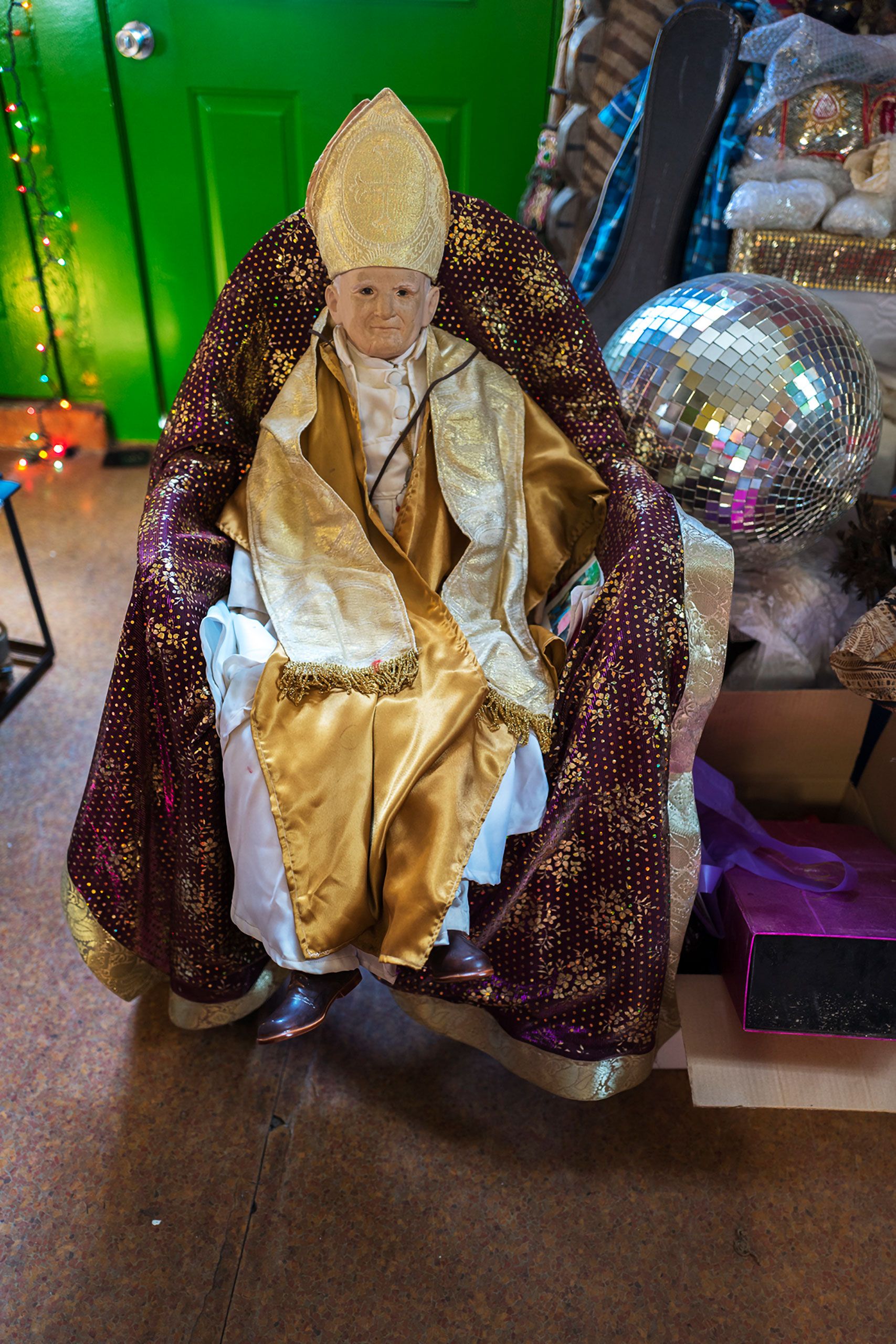 a minutrue replica of pope paul in a store in NOLA