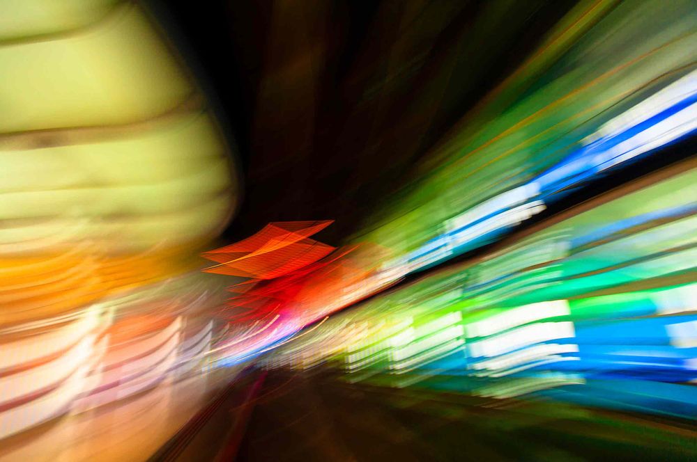 Underground walkway at chair airport United’s B and C concourses at Chicago O’Hare. neon sculpture/artist Michael Hayden 