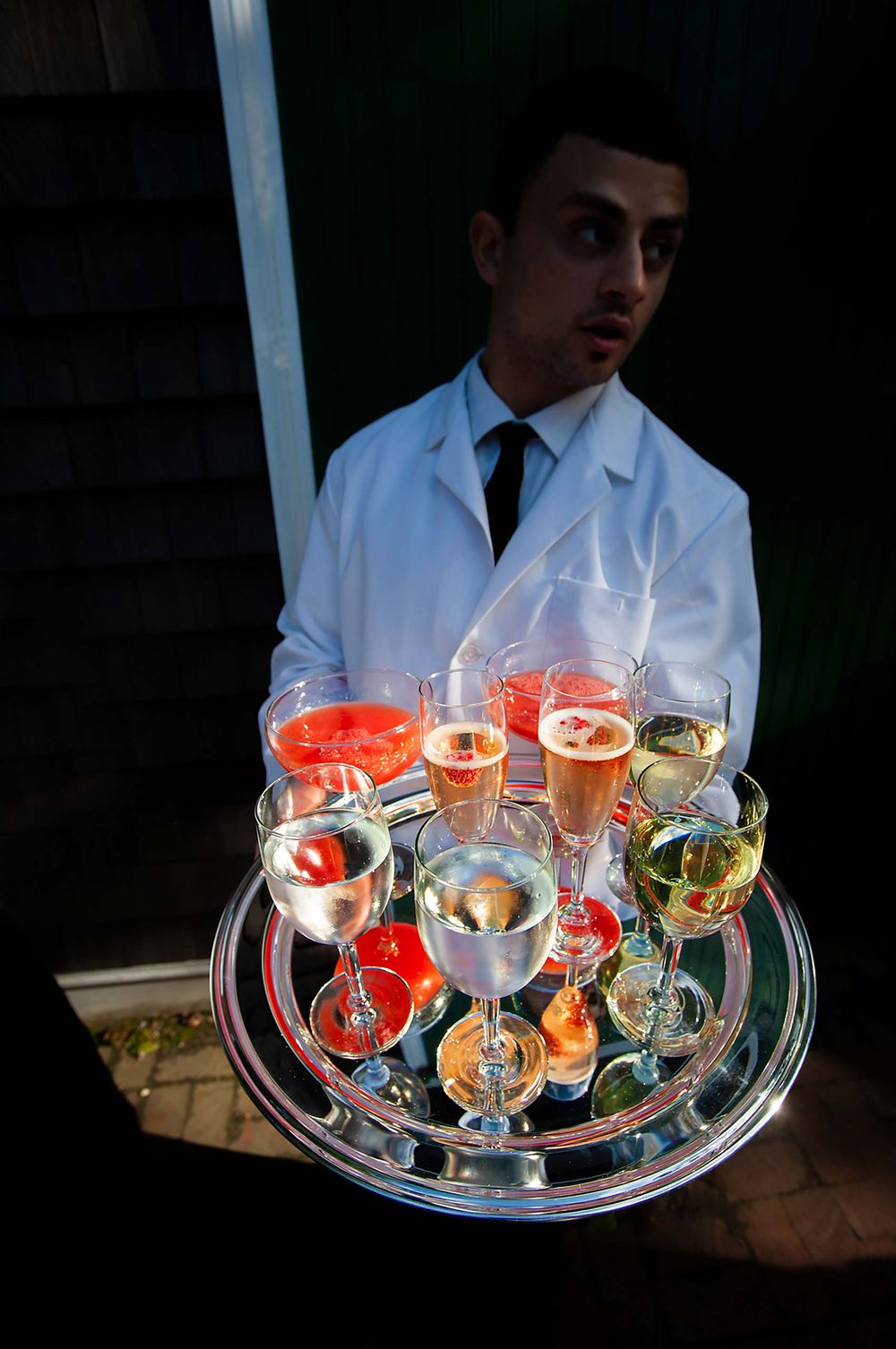 Waiter with a try full of drinks