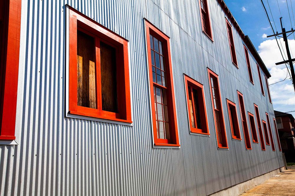 Building faced red window frames galvinsied new orleans NOLA