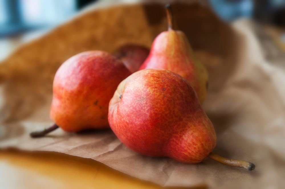 Pears in paper bag  advertising photo in studio