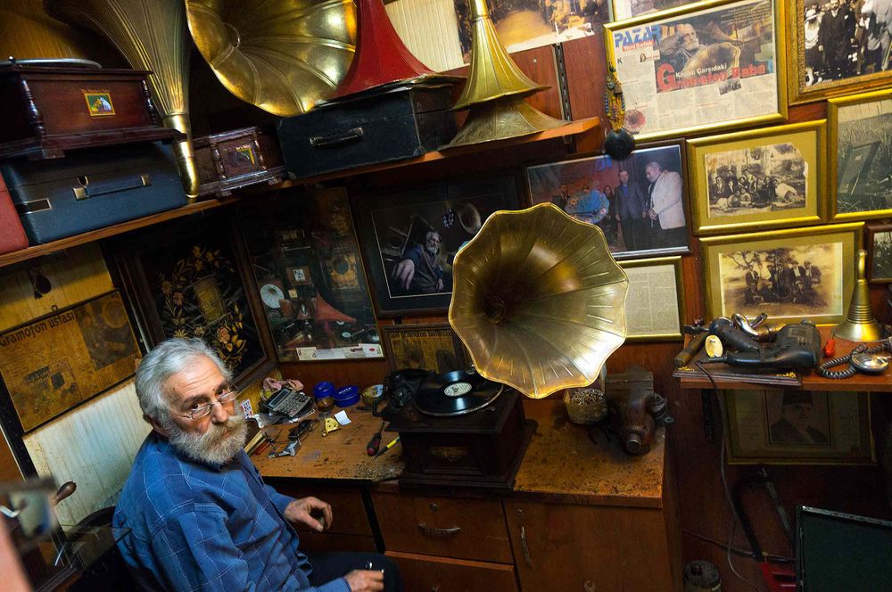 Victrola repairman in his shop in Istanvul Turkey