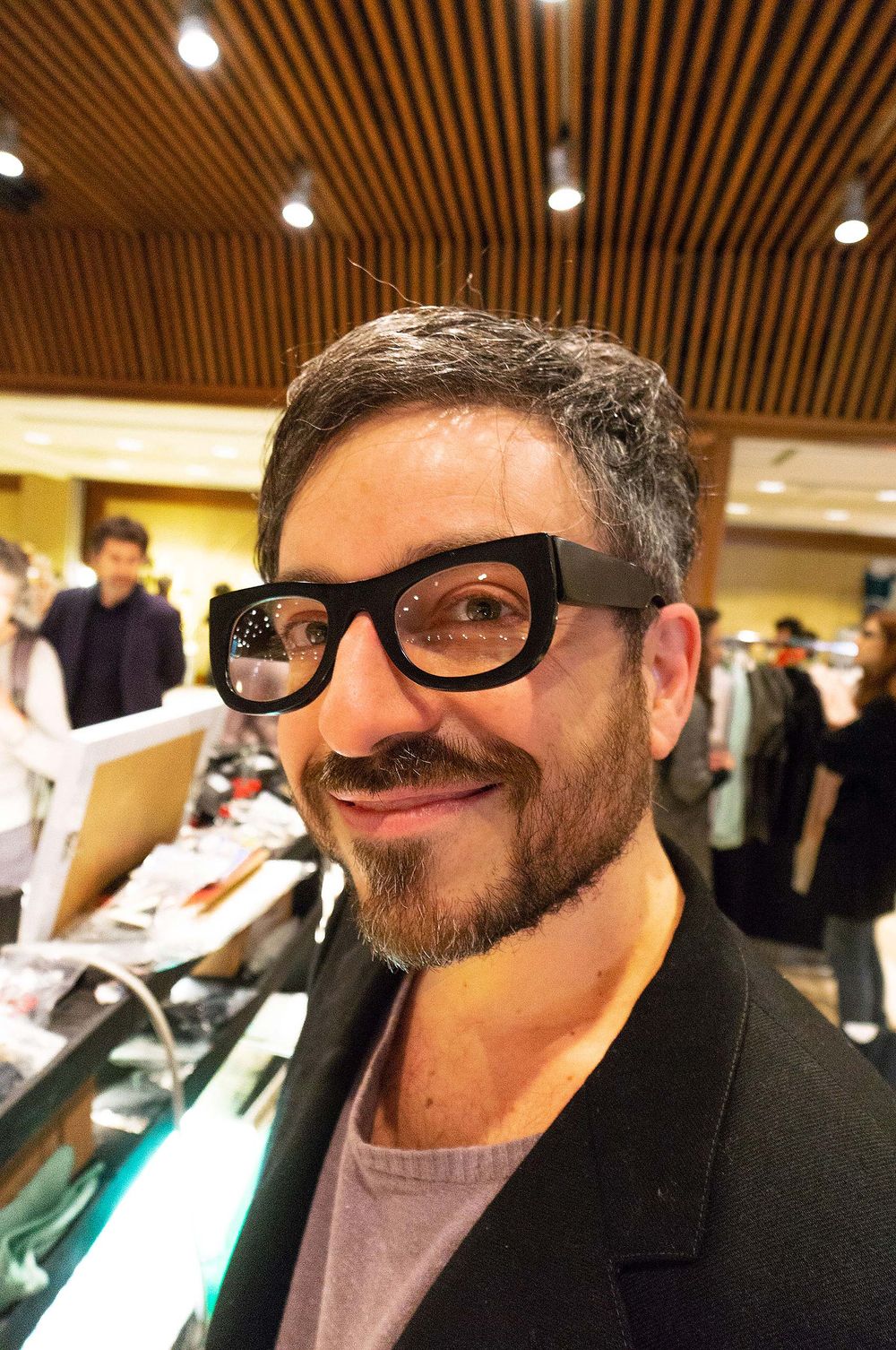 Young dude waring glasses he made. In Rome Otaly