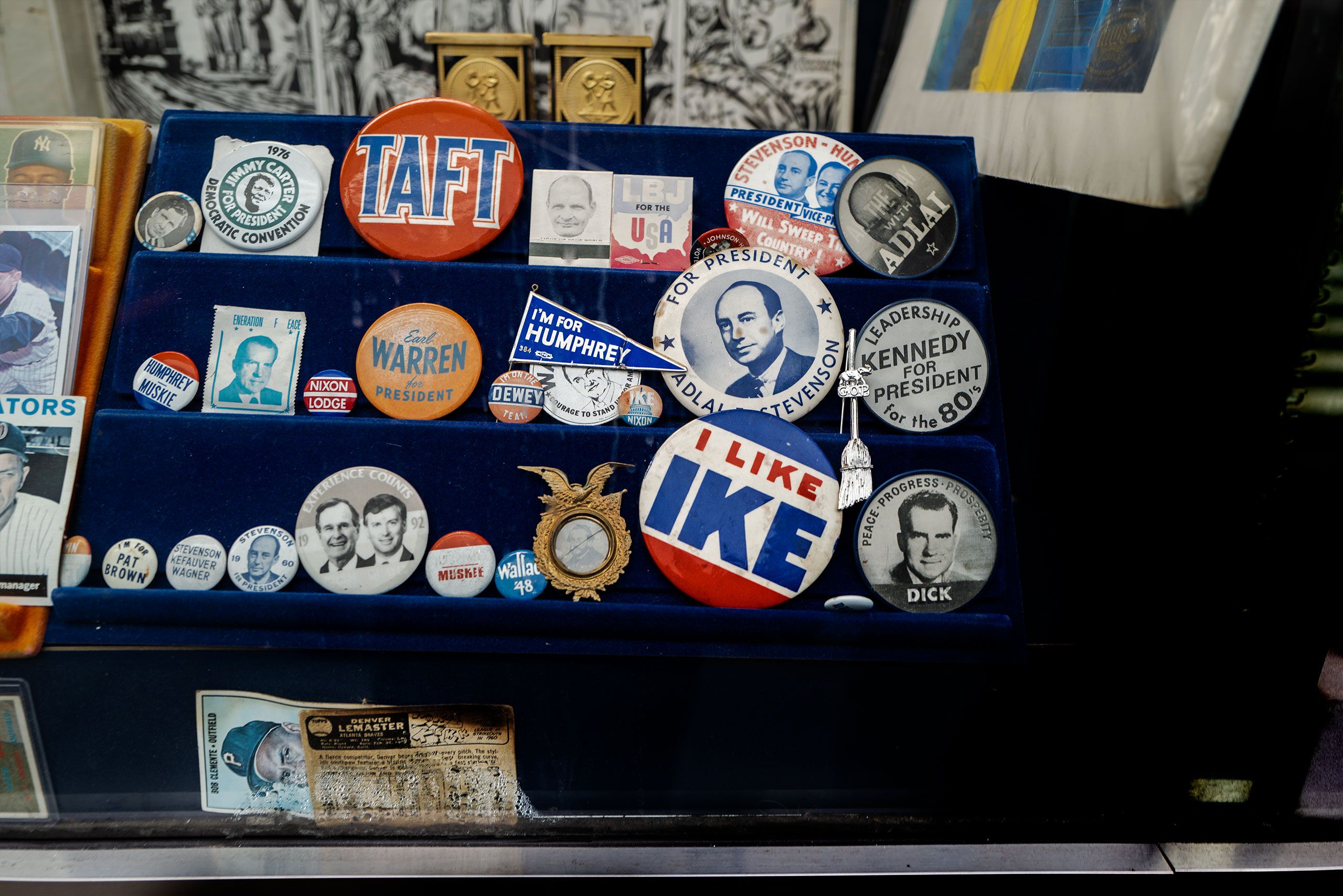 historical and political memorabilia pins in window in New York City