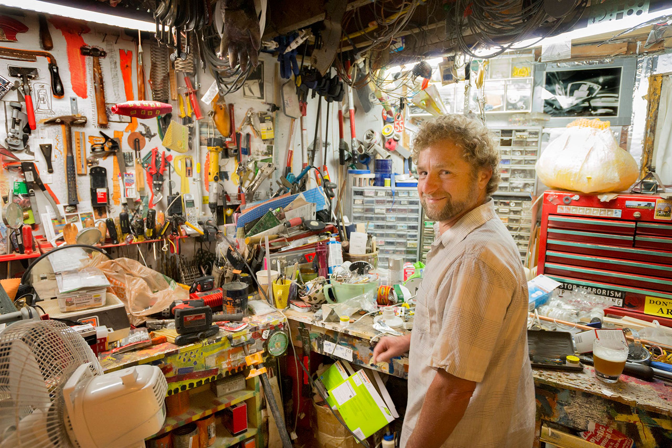 Joe Hemes in basement workshop 