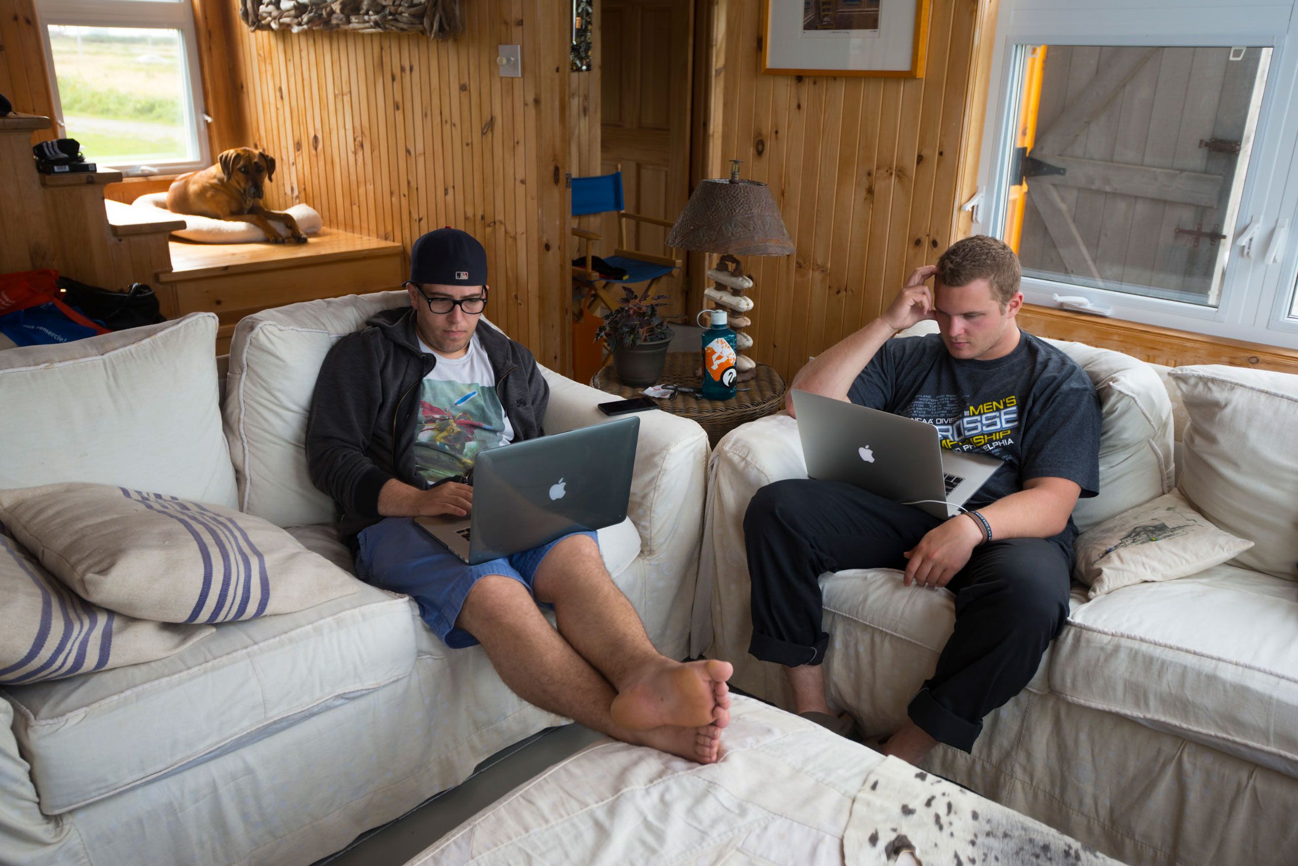Go out sadie and play sam and jack roos Magdalen Islands Îles de la Madeleine Quebec Canada  Harve Aubert  kids on laptops