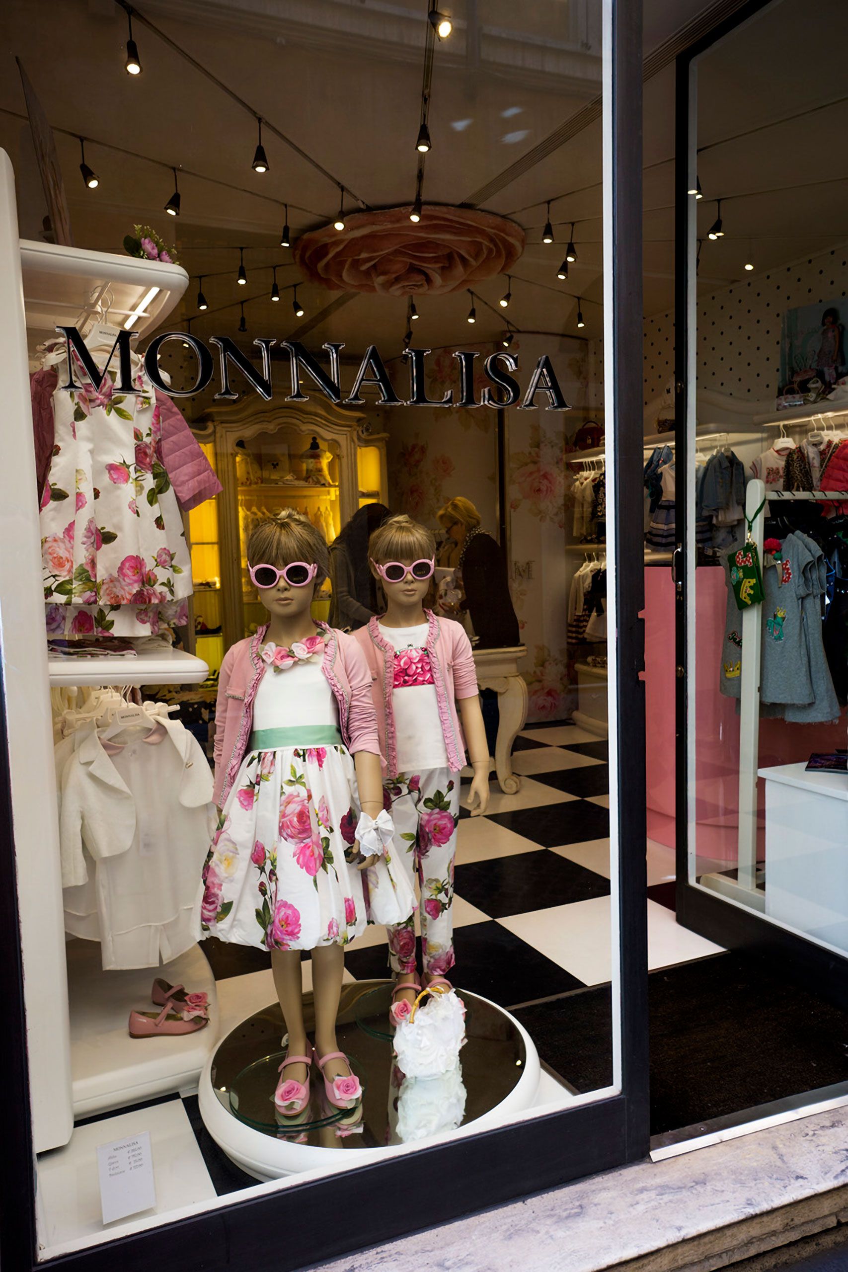 Monna Lisa store window in Rome Italy kids clothing 