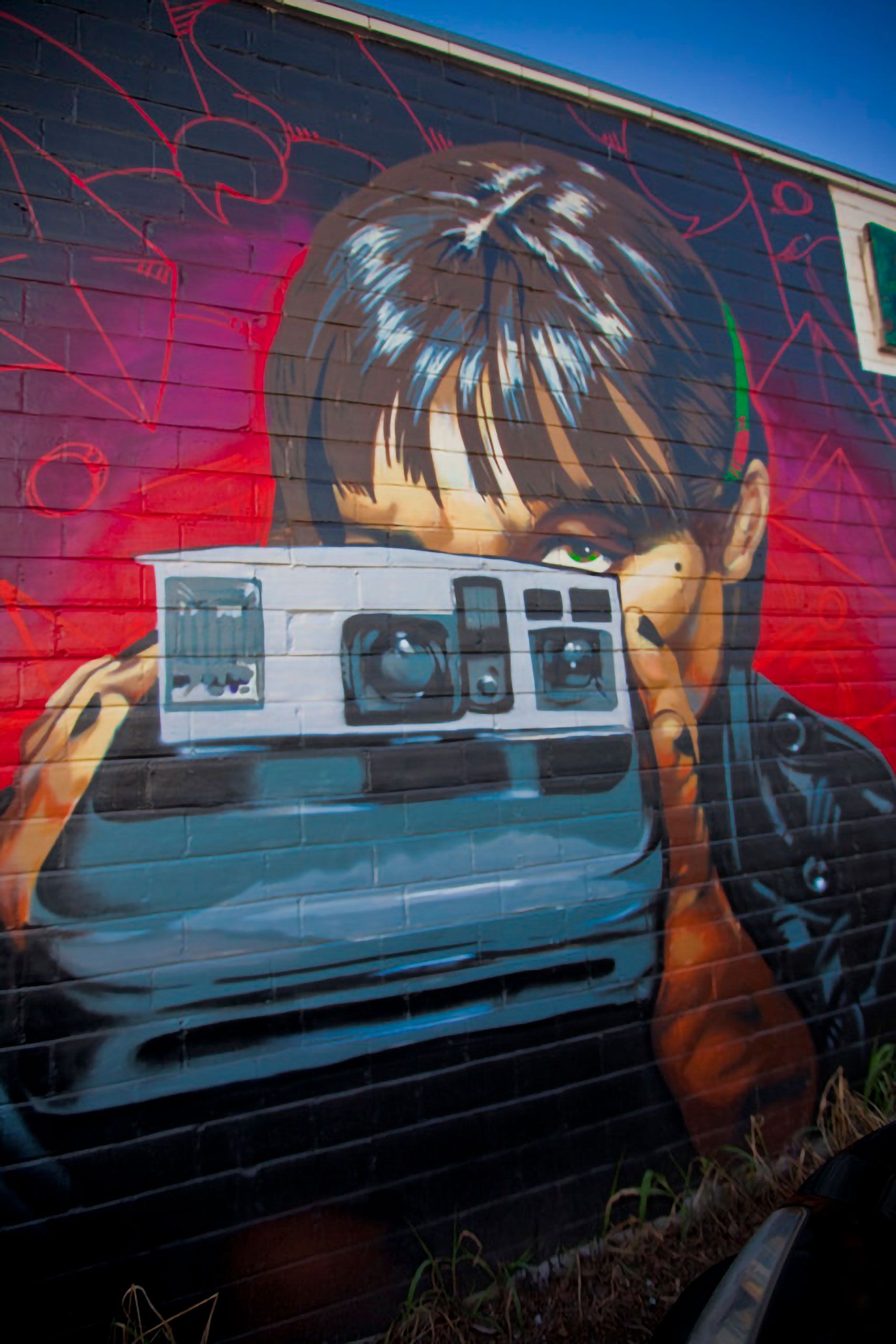 Painted poloroaid camera on wall in Austin Texas congress street 