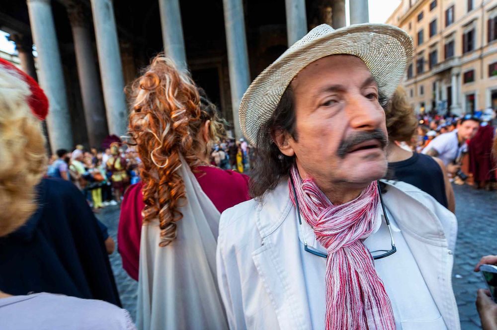 Dapper man juxtaposed by wonderful hair and a guy pepping at Piazza della Rotonda   in Rome, Italy at the Pantheon A lot going on here.