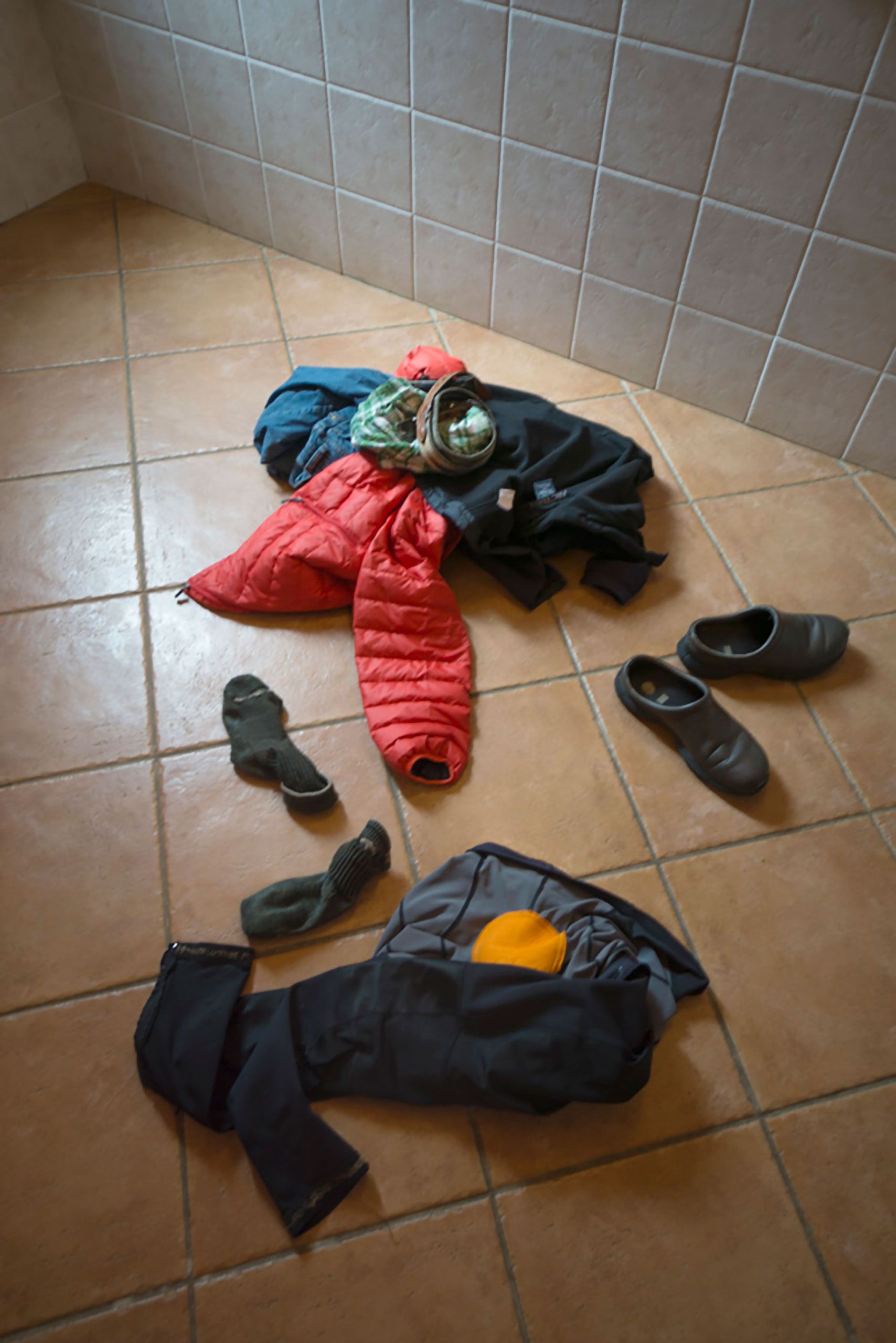 off go the cloths after long bike ride in Sardinia Italy